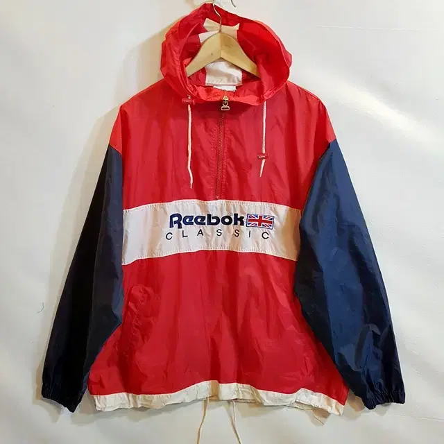 Reebok フード付きウィンドブレーカー Reebok メンズビンテージウィンドブレーカーフード付きジャンパー